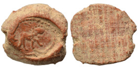 Greek-Roman. Circa 1st-3rd centuries AD. Terracotta token. 0.46 g, 11 mm.