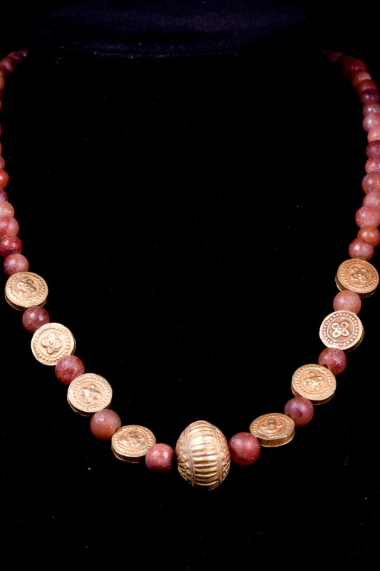 ANCIENT CARNELIAN, AGATE, AND GOLD NECKLACE

 Ca. 1st Millennium BC
 A beauti...