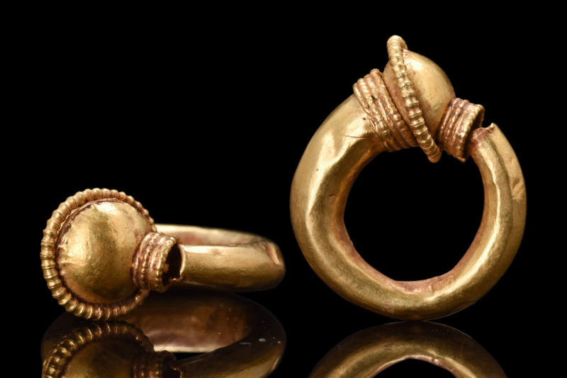 ETRUSCAN GOLD TRUMPET-SHAPED EARRING

 Ca. 400-300 BC
 A beautiful earring co...