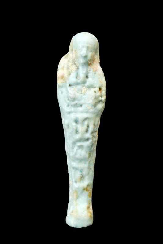 EGYPTIAN FAIENCE USHABTI

 Late Period, Ca. 664-332 BC
 A captivating blue fa...