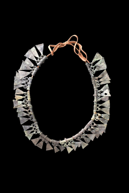 VIKING ERA NECKLACE WITH BRONZE DRAGON FEET AMULETS

 Ca. 900-1100 AD
 A rest...