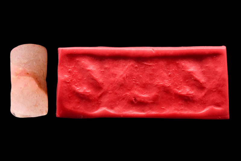 EARLY DYNASTIC II-III STONE CYLINDER SEAL

 Ca. 2700-2300 BC
 It depicts a wi...