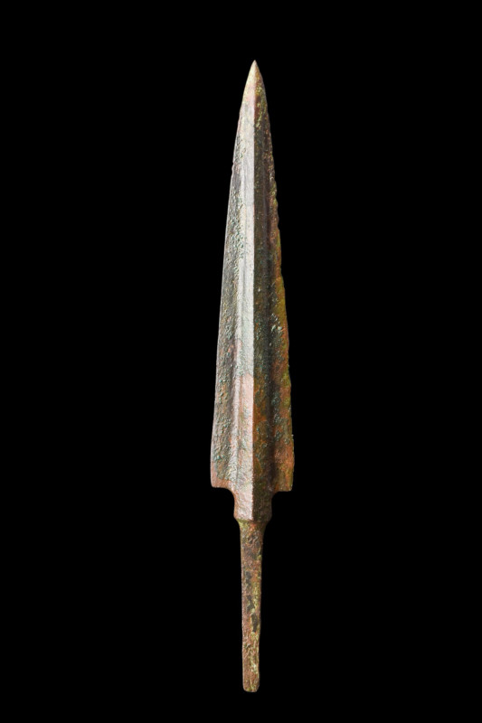 ANCIENT BRONZE SPEARHEAD

 Western Asiatic/Aegan, ca. 1200-700 BC
 A cast bro...