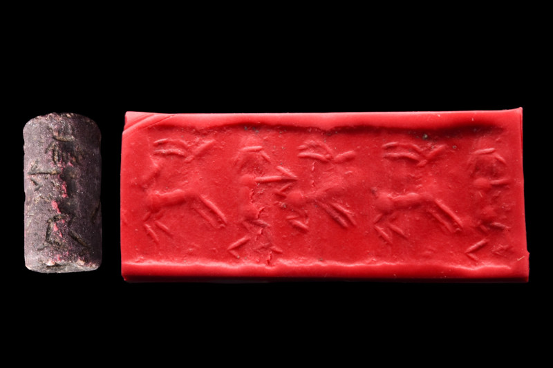 BACTRIAN DARK STONE CYLINDER SEAL

 Ca. 2nd millennium BC
 It depicts a hunte...