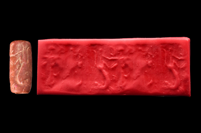 MESILIM PERIOD / DYNASTIC III (MESOPOTAMIA) BLACK STONE CYLINDER SEAL

 Ca. 26...