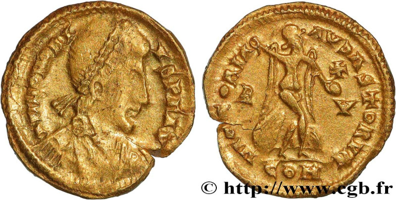 HONORIUS
Type : Tremissis 
Date : 408-423 
Mint name / Town : Ravenne 
Metal : g...