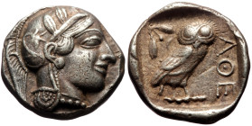 Attica, Athens AR Tetradrachm (Silver, 23mm, 15.96g) ca 454-404 BC.
Obv: Helmeted head of Athena right, with frontal eye.
Rev: AΘE, Owl standing right...