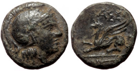 Troas, Assos (ca 400-241 BC) AE (Bronze, 10mm, 0.82g)
Obv: Helmeted head of Athena right 
Rev: Griffin seated left, with foreleg raised; ΑΣΣΙ above
SN...