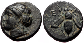 Ionia, Ephesos, AE (ca 375-325 BC)
Obv: E - Φ, Bee with straight wings.
Rev: Female head (Artemis?) left, wearing stephane.
Ref: BMC 68.