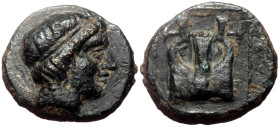 Ionia. Kolophon (ca 400-350 BC) AE Bronze (Bronze, 11mm, 1.11g)
Obv: Diademed head of Apollo right 
Rev: [K]-O, lyre within linear square border.
Ref:...