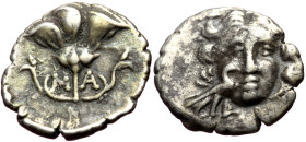 Caria, Mylasa (ca 170-130 BC) AR Drachm (Silver, 16mm, 1.88g) pseudo-Rhodian issue. 
Obv: Facing head of Helios; to lower left and superimposed on che...