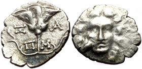 Caria, Mylasa. Early-mid 2nd century BC. AR Drachm (16mm, 1.99g, 12h). Pseudo-Rhodian type. 
Obv: Head of Helios facing; bird at cheek to left 
Rev: R...