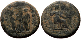 Lydia, Sardes (Bronze, 16mm, 4.88g) Tiberius and Livia (Julia Augusta) AD 13-47. 
Obv: Togate figure of emperor raising kneeling figure of Tyche of Sa...