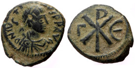 Justin I (518-527) AE Pentanummium (Bronze, 1.87g, 14mm). 
Obv: D N IVSTI-NVS P P AVG, diademad, draped, and cuirassed bust right 
Rev: Christogram; Γ...