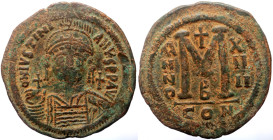 Justinian I (527-565) AE Follis (Bronze, 40mm, 22.45g) Constantinopolis, RY 14 = 540/1. 
Obv: D N IVSTINIANVS P P AVC Helmeted, diademed and cuirassed...