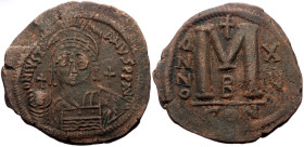 Justinian I (527-565) Æ Follis (Bronze, 38mm, 21.16g) Constantinople Dated RY 15 (AD 541/2). 
Obv: Diademed, helmeted, and cuirassed facing bust, hold...