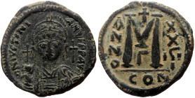 Justinian I (527-565) AE follis (Bronze, 17.65g, 31mm) Constantinople 
Obv: DNIVSTINI ANVSPPAVC Facing bust of Justinian I cuirassed in plumed helmet,...