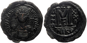 Justinian I (527-565) AE Follis (Bronze, 36mm, 19.19g) Nicomedia.
Obv: D N IVSTINIANVS P P AVG.
Helmeted and cuirassed bust facing, holding globus cru...