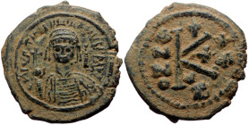 Justinian I (527-565) AE Half Follis (Bronze, 26mm, 8.25g) Cyzicus Dated RY 30 (556/7). 
Obv: Helmeted and cuirassed bust facing, holding globus cruci...