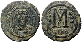 Justinian I (527-565) AE Follis (Bronze, 34mm, 17.07g) Nicomedia.
Obv: D N IVSTINIANVS P P AVG, Helmeted and cuirassed facing bust, holding globus cru...