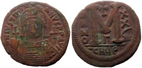 Justinian I, (527-565) AE follis (Bronze, 17.23g, 36mm) Antioch as Theoupolis 
Obv: DN IVSTINIANVS PP AVG, Justinian bust facing
Rev. :arge M/ officin...