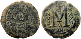 Justinian I (527-565), AE follis, Antioch as Theoupolis mint.
Obv: D N IVSTINIANVS PP AVG, Justinian bust facing, around
Rev. Large M, ANNO in left fi...