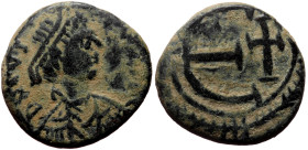 Justinian I (527-565) AE Pentanummium (Bronze, 2.60g, 15mm) Rome, 562-565 
Obv: DNIVSTINI ANVSPPAVC, Diademed bust right. 
Rev: Large E with cross to ...