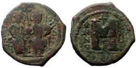Justin II with Sophia (565-578) AE Follis (Bronze, 14,02g, 30mm) 565-578 AD. Antioch, year 8. 
Obv: blundered legend with Justin left, Sophia right ni...
