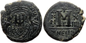 Maurice Tiberius (582-602) AE Follis (Bronze, 28mm, 8.75g) Antioch, year 14 = 595/596. 
Obv: D N MAVΓI CN P AVT, facing bust, wearing crown with trefo...