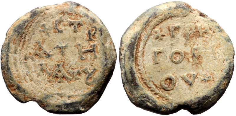 Byzantine Pb Seal (25mm, 13,38g) of Gregorios stratelates (AD 7th century).
Obv...