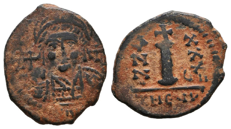 Byzantine Coins AE, 7th - 13th Centuries. 
Reference:

Condition: Very Fine
...