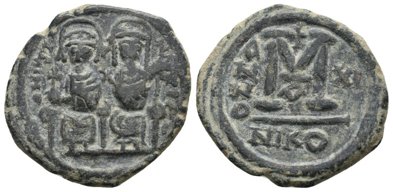 JUSTIN II (565-578). Follis. Nicomedia.
10.6 Gr. 28.5 mm.