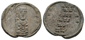 BYZANTINE LEAD SEALS.
5.60 Gr. 24.4 mm.