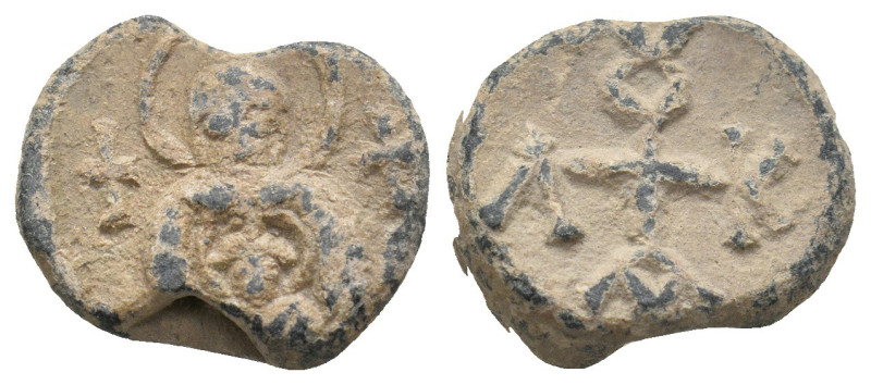 BYZANTINE LEAD SEALS.
6.93 Gr. 19.1 mm.