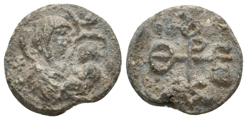 BYZANTINE LEAD SEALS.
6.71 Gr. 19.5 mm.