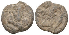 BYZANTINE LEAD SEALS.
8.54 Gr. 22.1 mm.