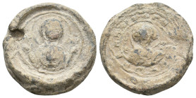 BYZANTINE LEAD SEALS.
11.57 Gr. 23.4 mm.