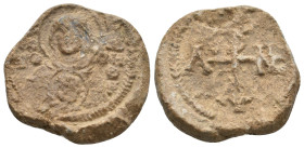 BYZANTINE LEAD SEALS.
15.48 Gr. 25.8 mm.