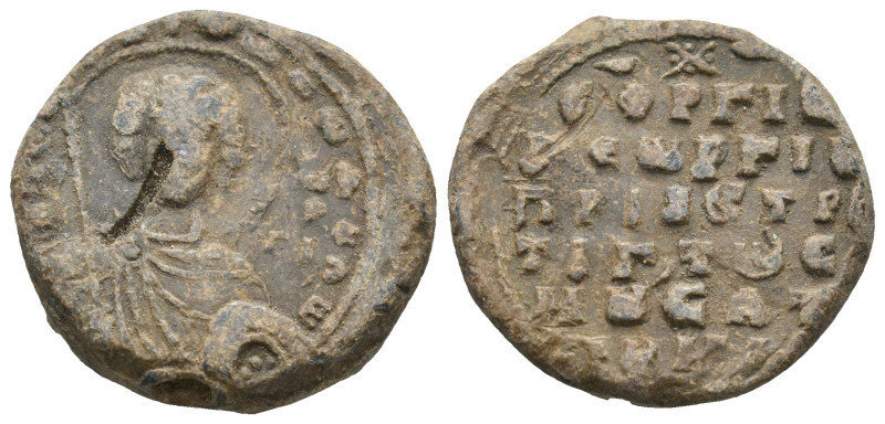 BYZANTINE LEAD SEALS.
20.93 Gr. 26.6 mm.