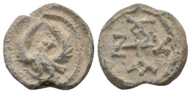 BYZANTINE LEAD SEALS.
7.44 Gr. 18 mm.