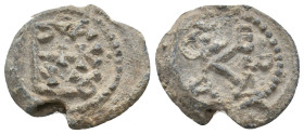 BYZANTINE LEAD SEALS.
8.46 Gr. 21.5 mm.