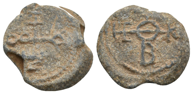 BYZANTINE LEAD SEALS.
8.77 Gr. 20.1 mm.