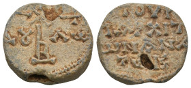 BYZANTINE LEAD SEALS.
9.3 Gr. 20.4 mm.