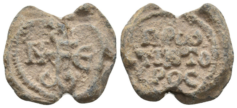 BYZANTINE LEAD SEALS.
9.08 Gr. 24.1 mm.