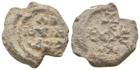 BYZANTINE LEAD SEALS.
9.8 Gr. 23.8 mm.