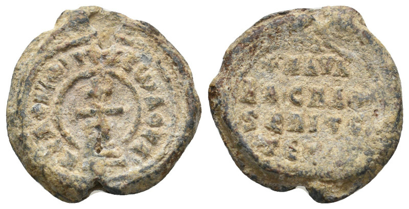 BYZANTINE LEAD SEALS.
9.63 Gr. 22.1 mm.