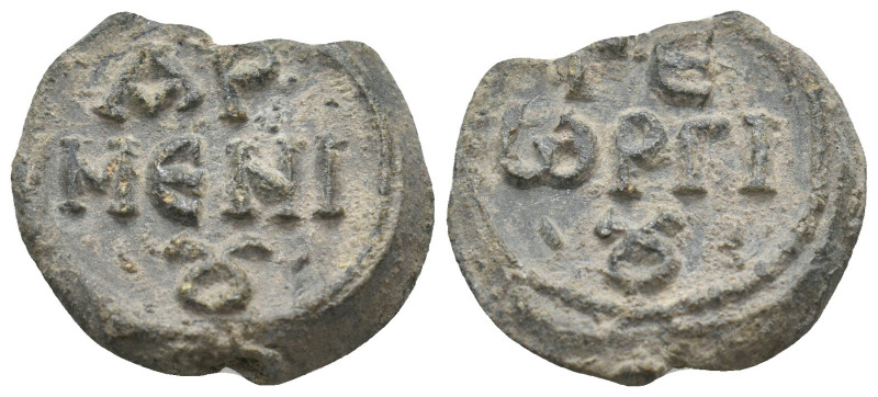 BYZANTINE LEAD SEALS.
10.67 Gr. 24.6 mm.