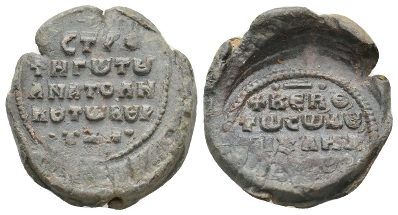 BYZANTINE LEAD SEALS.
11.76 Gr. 24.4 mm.
