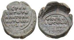 BYZANTINE LEAD SEALS.
11.76 Gr. 24.4 mm.