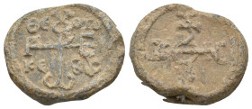BYZANTINE LEAD SEALS.
12.54 Gr. 21.1 mm.